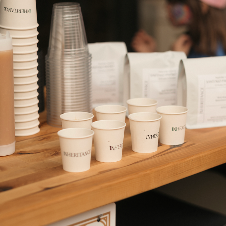 Cups and bags of coffee set out at a church hospitality station - Inheritance Coffee, Pensacola, FL church coffee consulting
