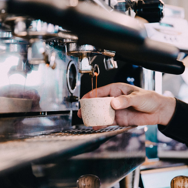 Barista pulling a double espresso - better church coffee hospitality from Inheritance Coffee, Pensacola, FL