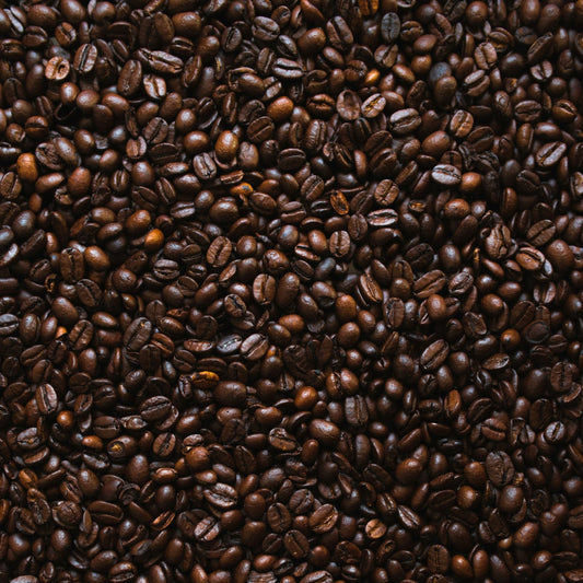Brown roasted coffee beans in close texture