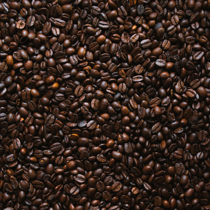 Brown roasted coffee beans in close texture