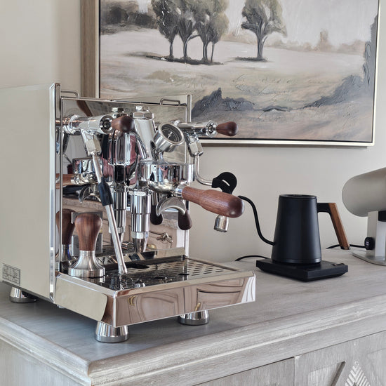 Turin Gallatin V espresso machine on a kitchen counter with grinder and kettle, from Inheritance Coffee in Pensacola, FL for home brewers and cafes
