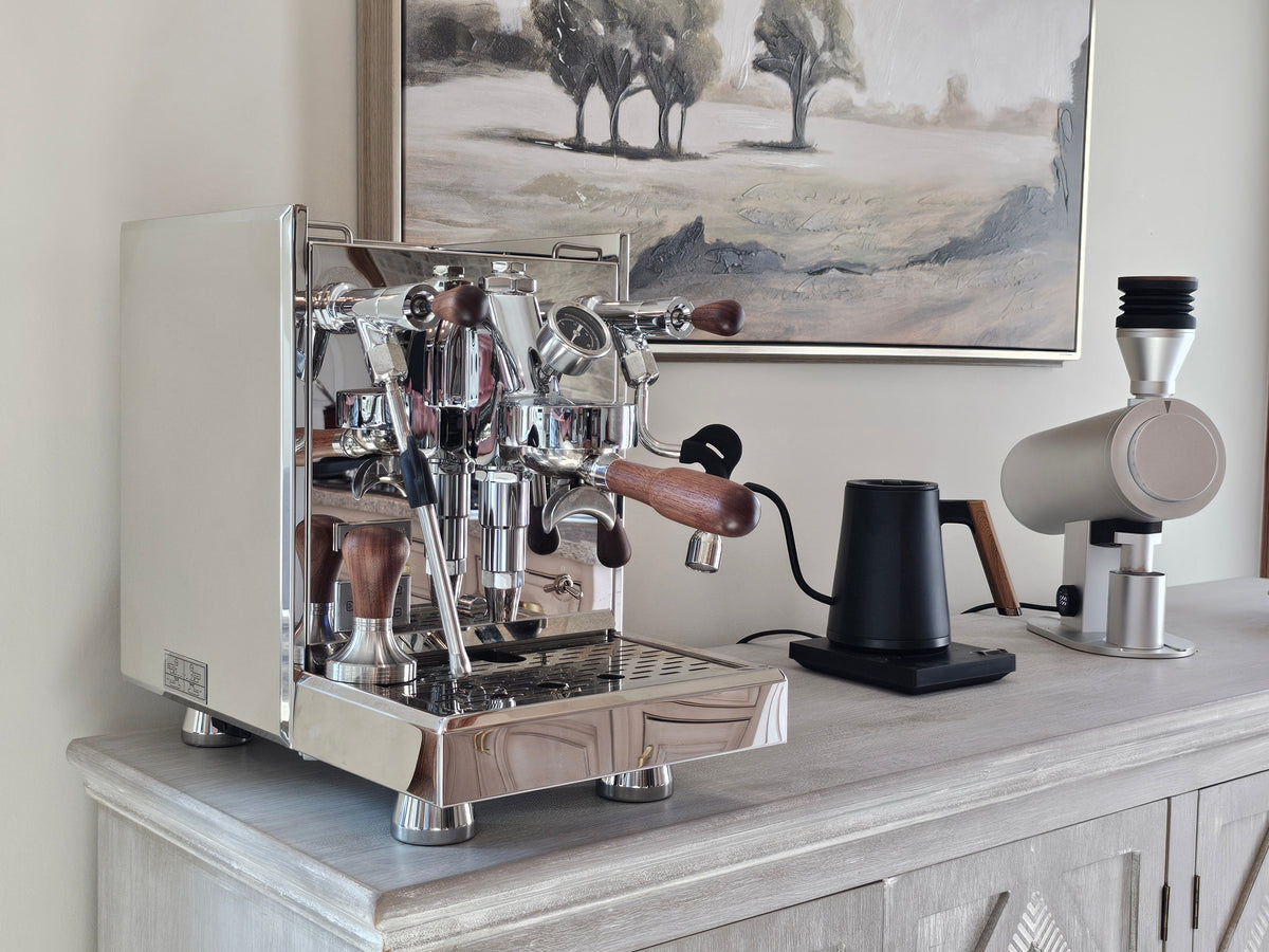 Turin Gallatin V espresso machine on a kitchen counter with grinder and kettle, from Inheritance Coffee in Pensacola, FL for home brewers and cafes