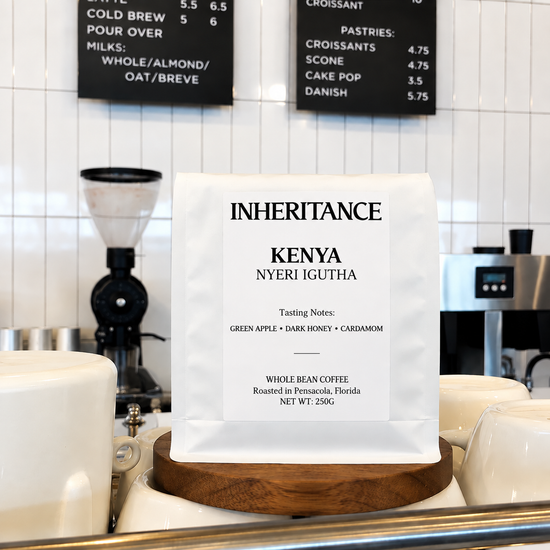 Bag of Kenya Nyeri Igutha coffee on a cafe counter, from Inheritance Coffee, Pensacola, FL specialty roaster for cafes, churches and home brewers