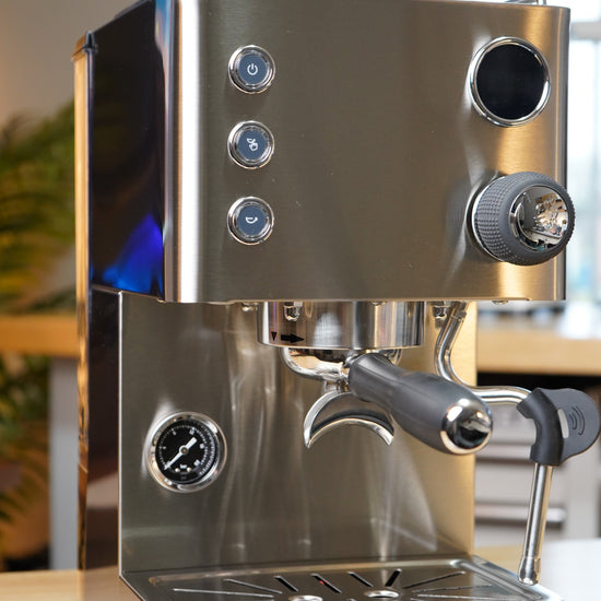 Turin Legato V2 stainless machine with portafilter, angled view, for home baristas and cafes from Inheritance Coffee in Pensacola, FL