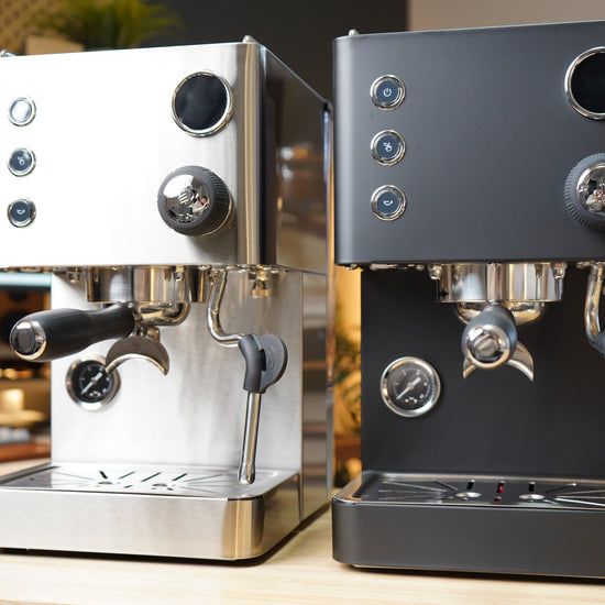Turin Legato V2 machines in white and black side by side, for home baristas and cafes from Inheritance Coffee in Pensacola, FL