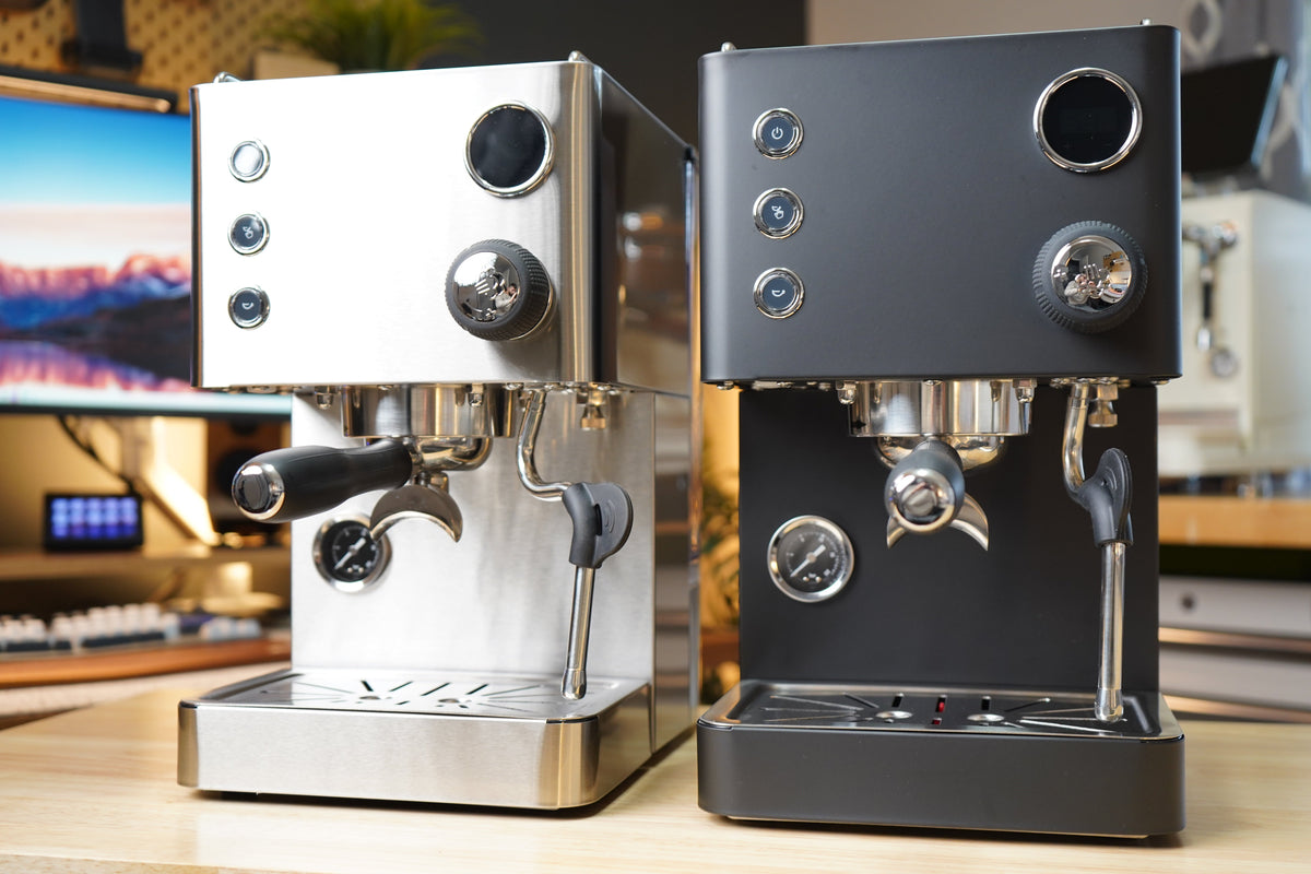 Turin Legato V2 machines in white and black side by side, for home baristas and cafes from Inheritance Coffee in Pensacola, FL