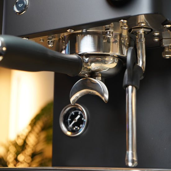 Turin Legato V2 black machine with portafilter, close view, for home baristas and cafes from Inheritance Coffee in Pensacola, FL