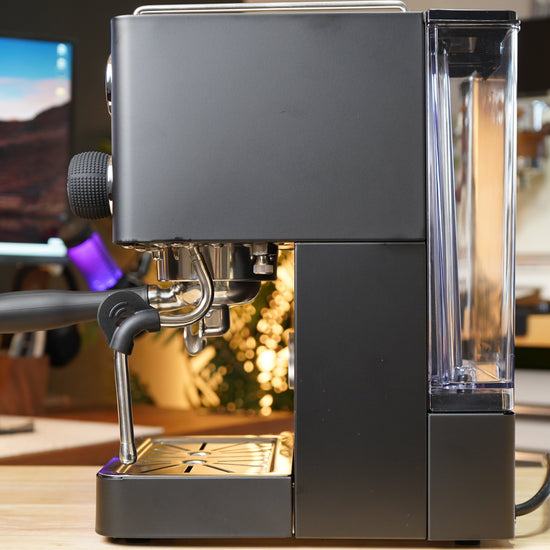 Turin Legato V2 black espresso machine on a desk, for home baristas and cafes from Inheritance Coffee in Pensacola, FL
