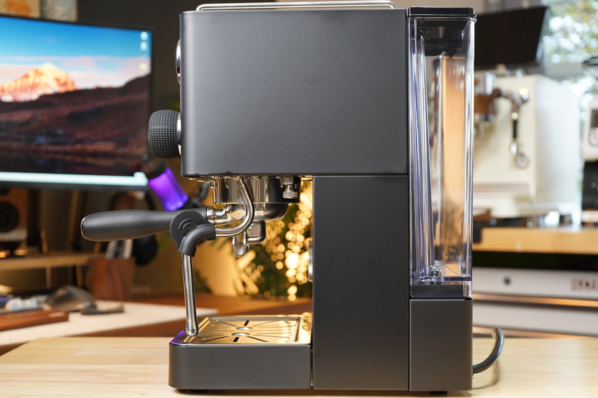 Turin Legato V2 black espresso machine on a desk, for home baristas and cafes from Inheritance Coffee in Pensacola, FL