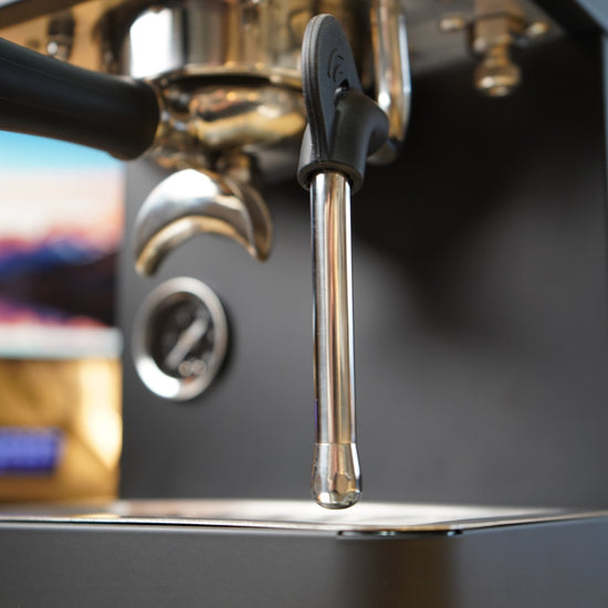 Turin Legato V2 black machine pulling a shot, for home baristas and cafes from Inheritance Coffee in Pensacola, FL
