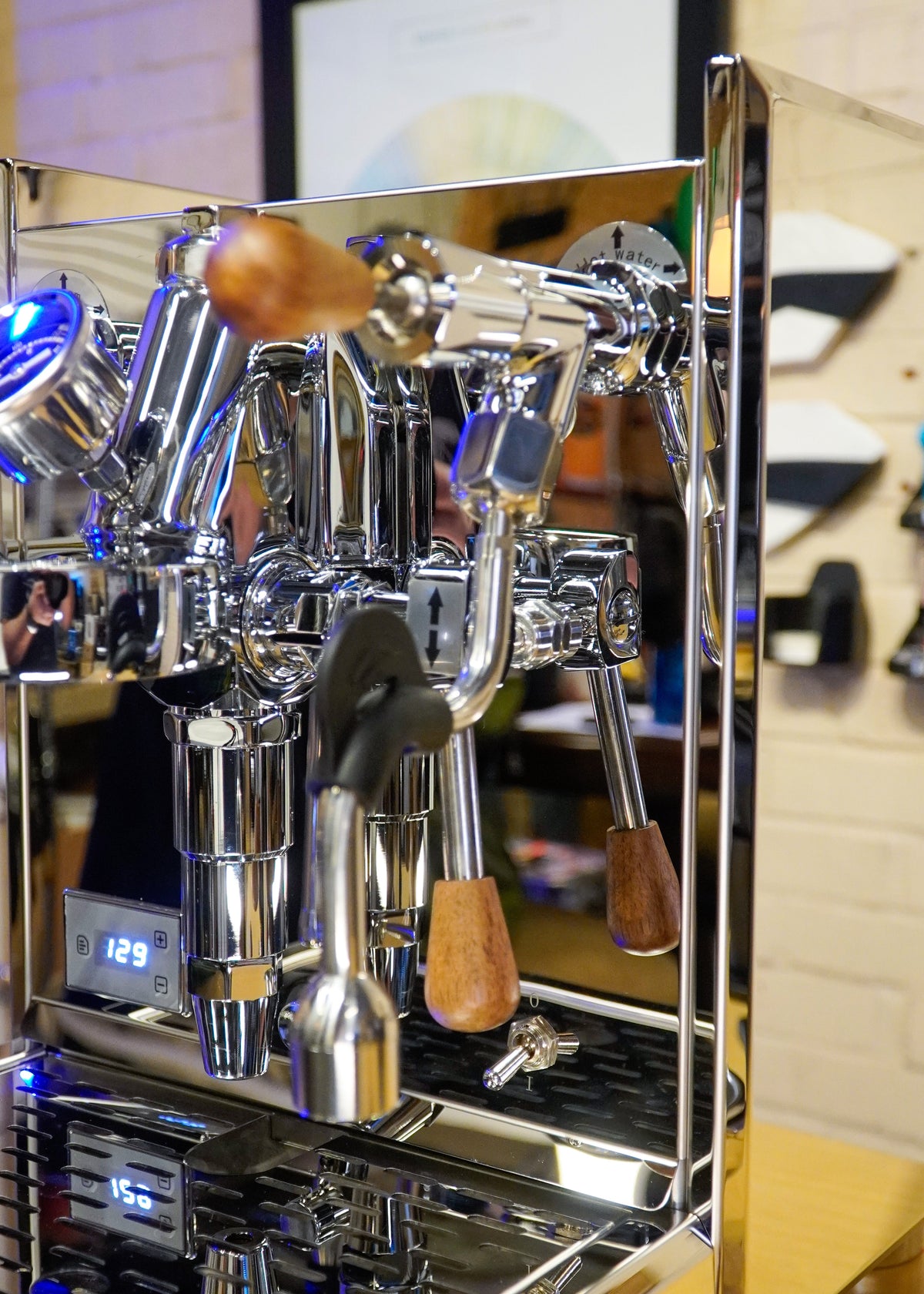 Turin Gallatin V machine showing wood-handled portafilter and knobs, from Inheritance Coffee in Pensacola, FL for home brewers and cafes