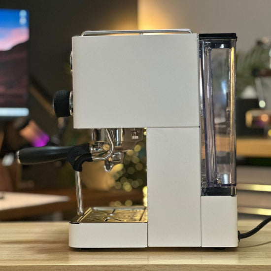 Turin Legato V2 cream espresso machine, side view with water tank - equipment from Inheritance Coffee, Pensacola, FL serving cafes, churches and home brewers