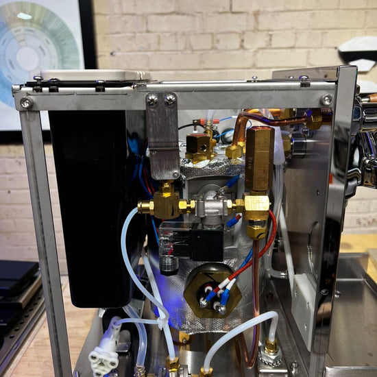 Turin Gallatin stainless espresso machine on a coffee bar - equipment from Inheritance Coffee, Pensacola, FL serving cafes, churches and home brewers