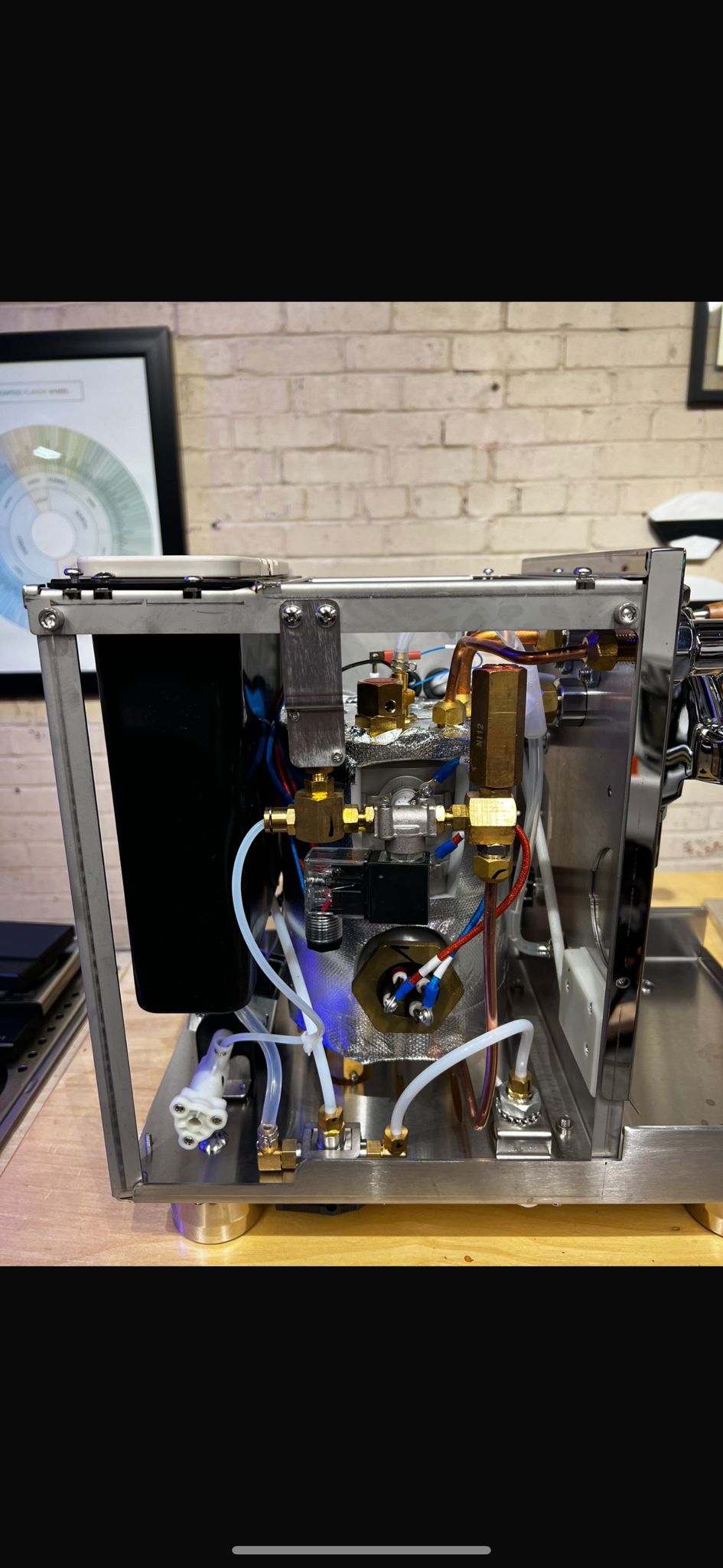 Turin Gallatin stainless espresso machine on a coffee bar - equipment from Inheritance Coffee, Pensacola, FL serving cafes, churches and home brewers