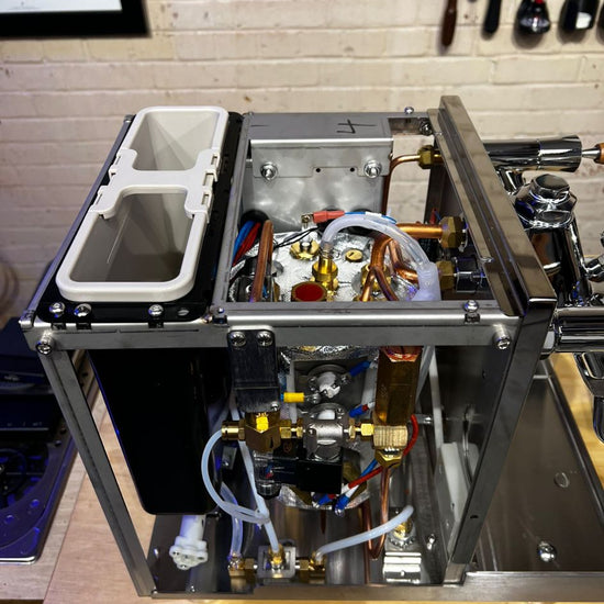 Turin Gallatin stainless espresso machine on a coffee bar - equipment from Inheritance Coffee, Pensacola, FL serving cafes, churches and home brewers